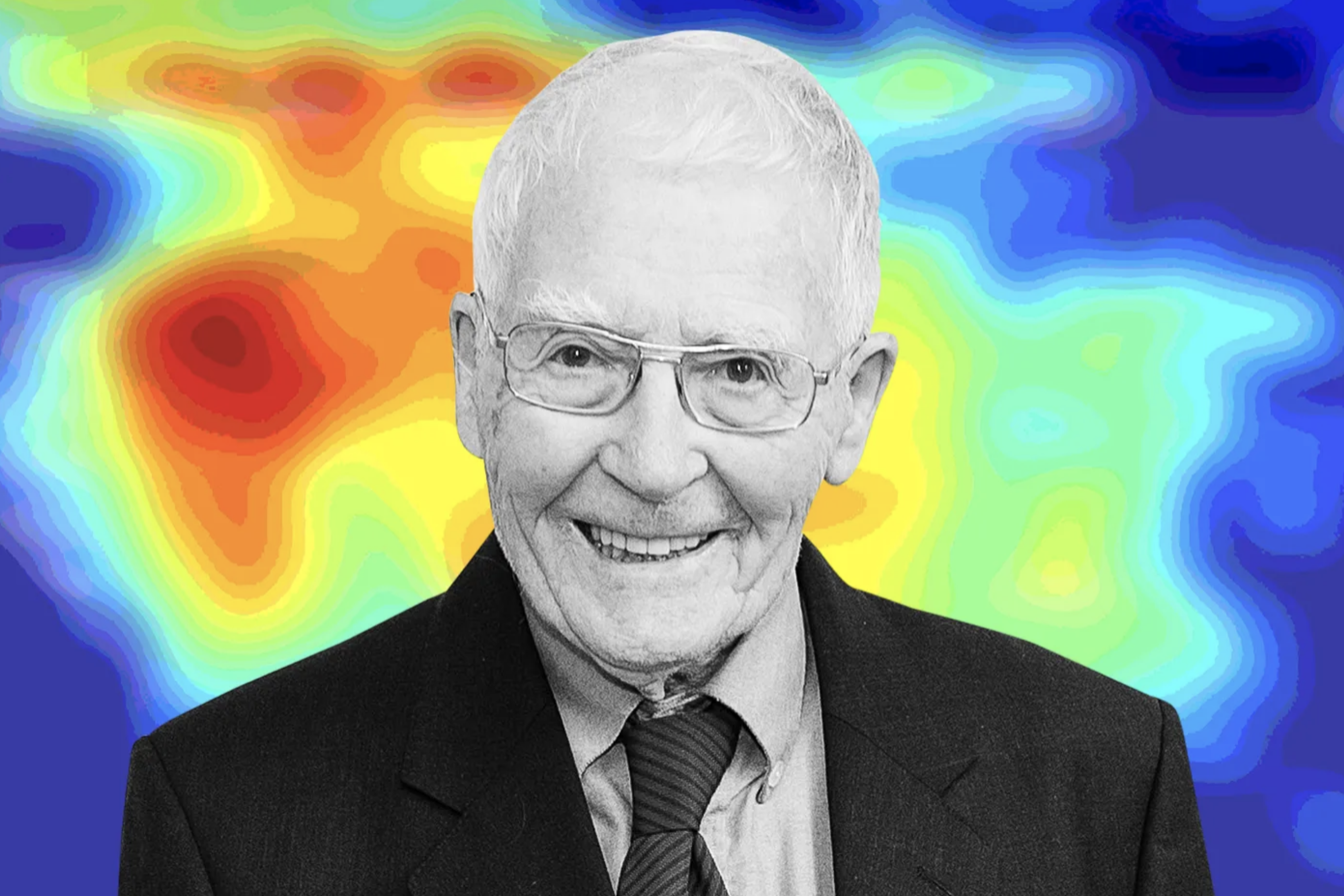 James Lovelock smiling in front of a heat map