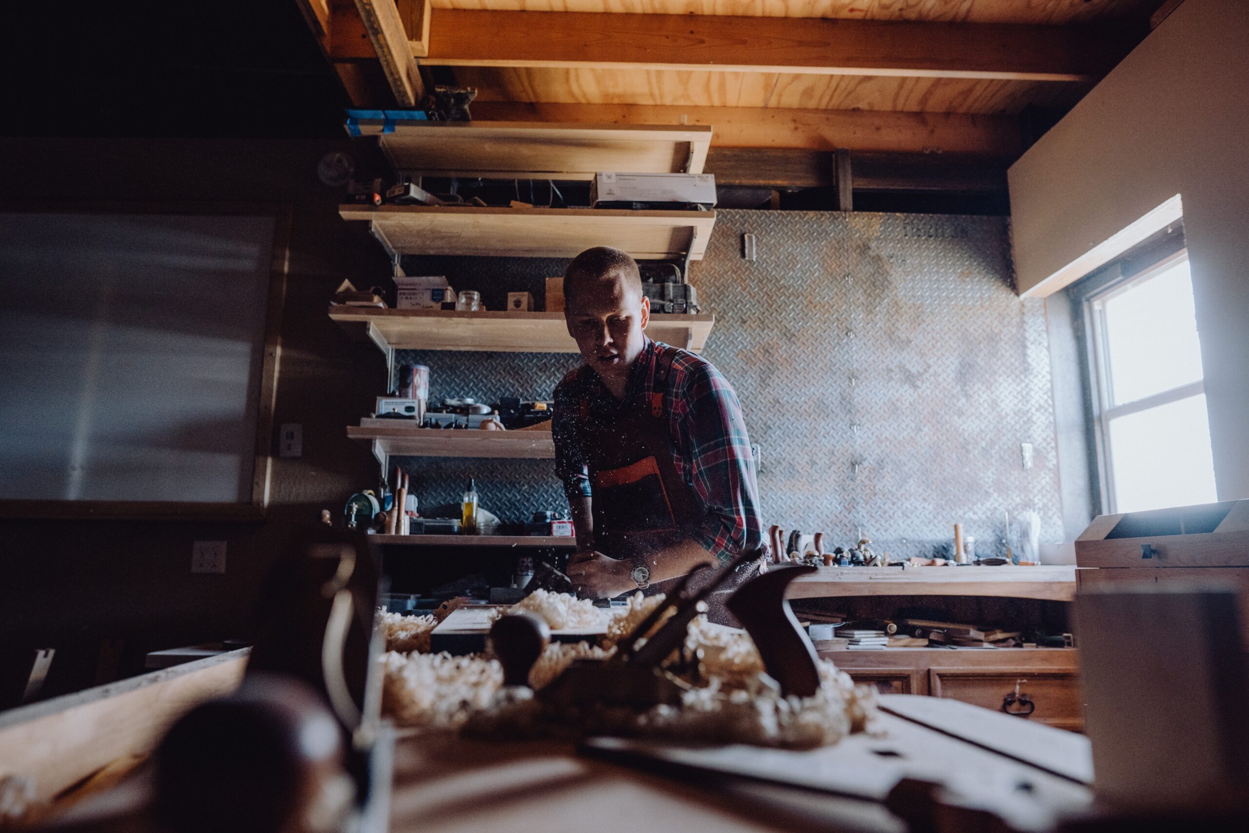 A person working in a woodworking shop