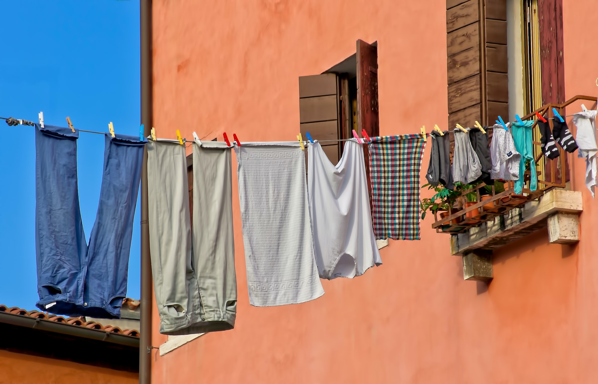 Laundry hanging to dry over a street